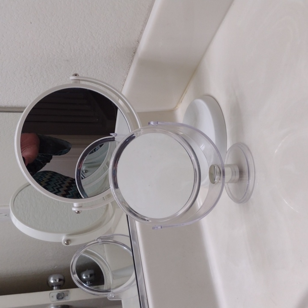 Two makeup mirrors a set, one white one clear acrylic reversible side magnified